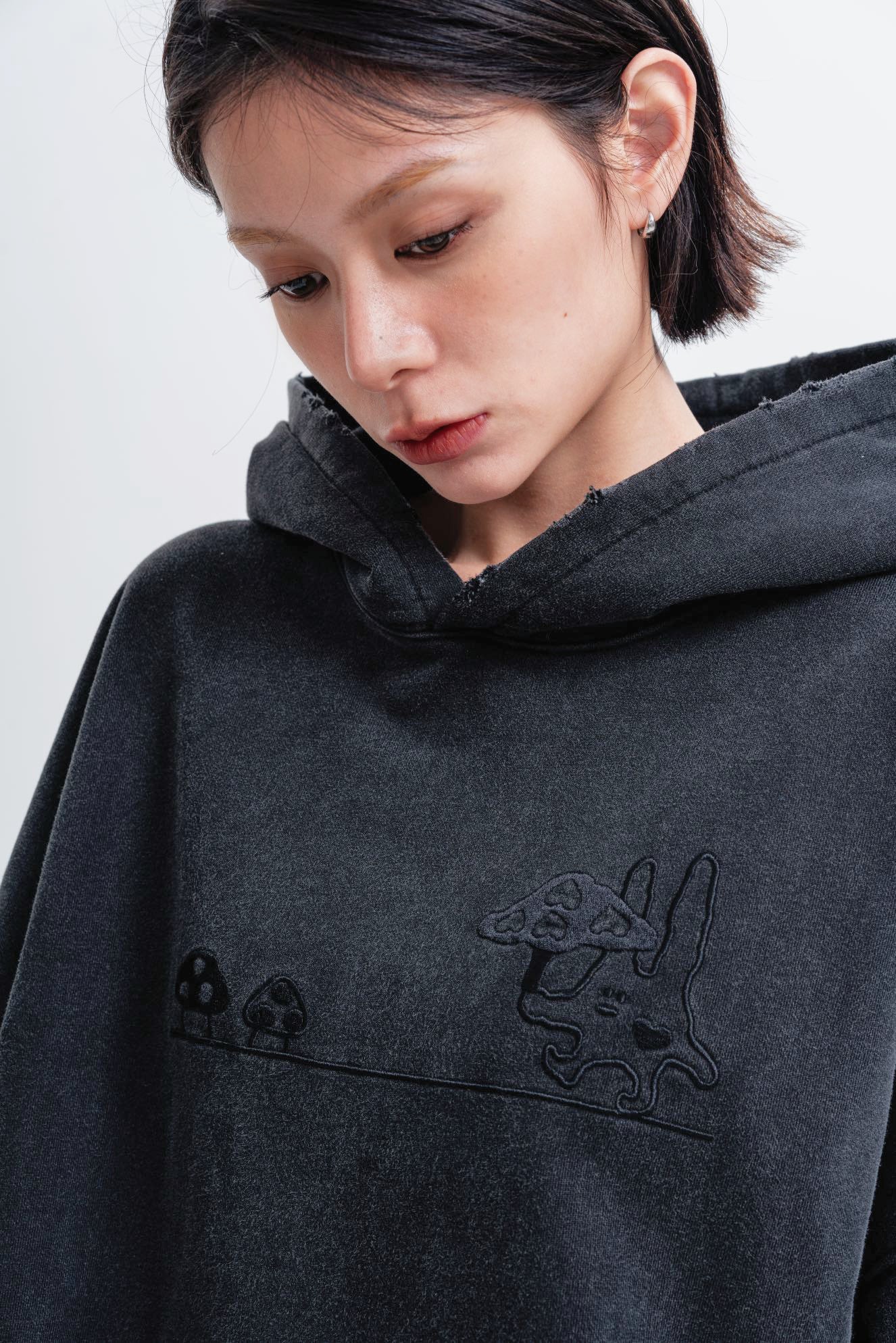 ‘MUSHROOM DEFENDER’ HOODIE IN BLACK